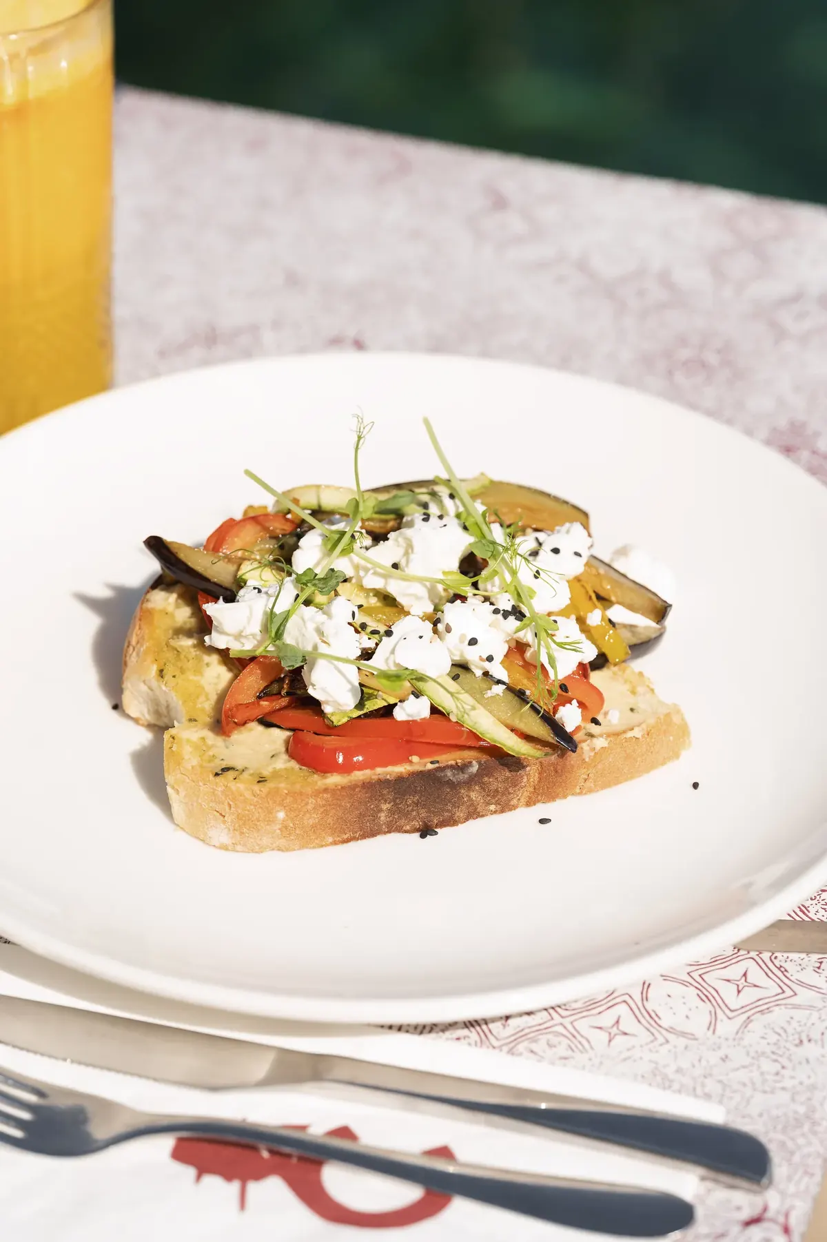 Vegetable and feta bruschetta beside the bay